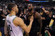 Jayson Tatum (#0) of the Boston Celtics talks with LeBron James (#23) of the Cleveland Cavaliers after Game Seven of the 2018 NBA Eastern Conference Finals.