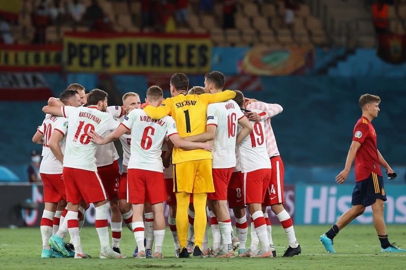 Spain held again as Poland fight back