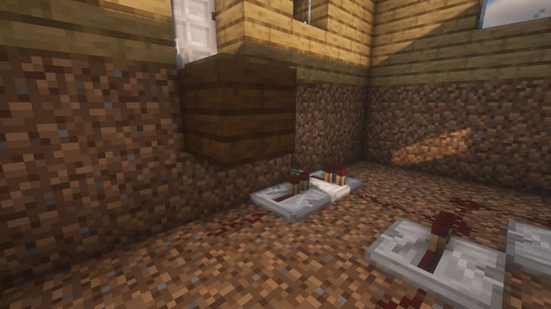 Pressure plate in front of the door (Image via Minecraft)