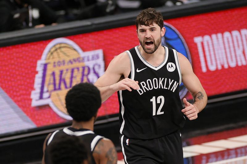 Joe Harris (#12) of the Brooklyn Nets reacts after making a three-point basket.