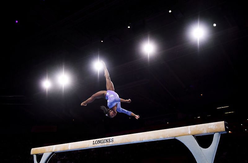 Simone Biles in action in 2019 (Photo by Laurence Griffiths/Getty Images)
