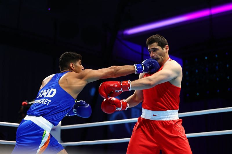 India&#039;s Sanjeet Singh (left) in action at the Asian Boxing Championships