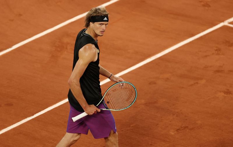 Alexander Zverev celebrates after beating Kei Nishikori at Roland Garros 2021