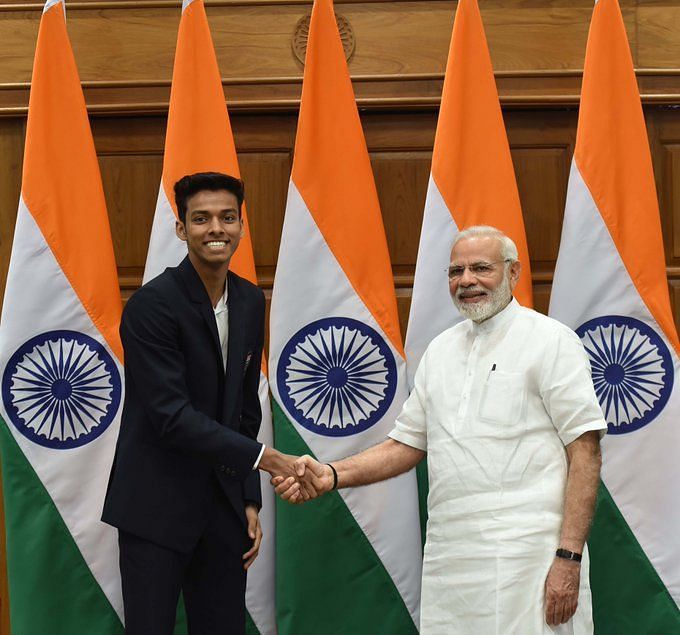 Chirag Shetty (left) with Prime Minister Narendra Modi