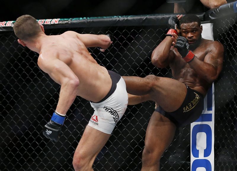 Stephen Thompson lands a spinning body kick on Tyron Woodley at UFC 205