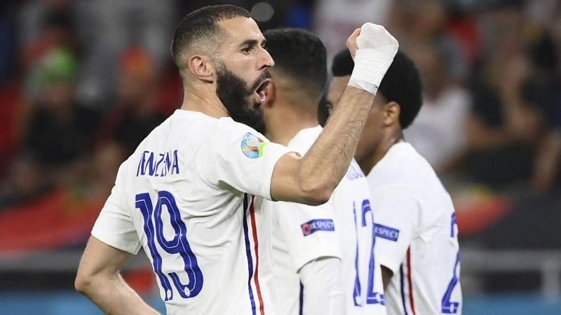 Karim Benzema exults after scoring his first goal for France in almost six years, at Euro 2020