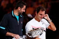 Marin Cilic and Roger Federer at the 2018 Australian Open Men's Trophy Ceremony