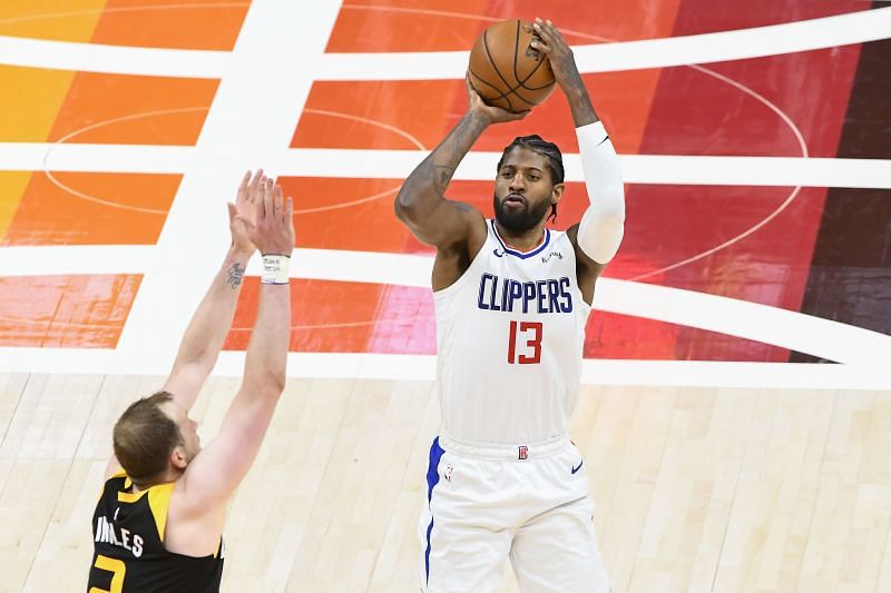 Paul George shoots over Joe Ingles