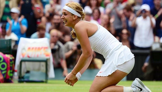 Sabine Lisicki reacts after downing Serena Williams at 2013 Wimbledon.