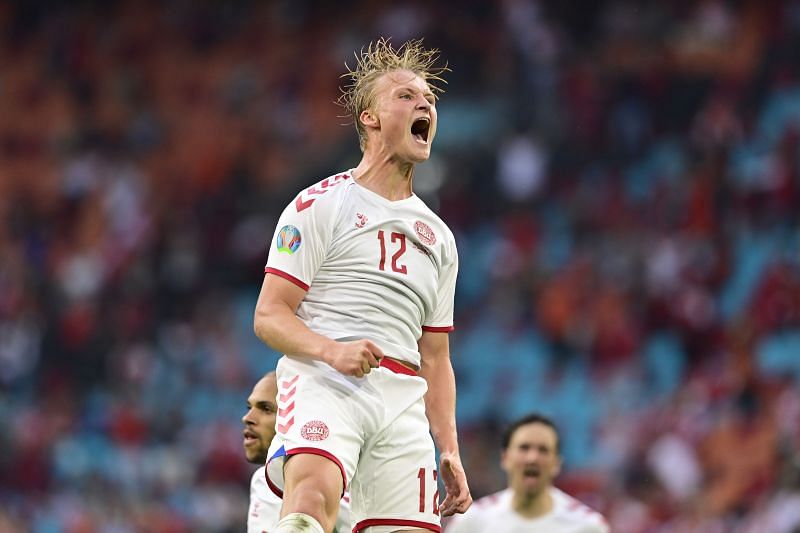 Kasper Dolberg scored twice to seal an emphatic victory over Wales
