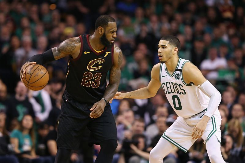 LeBron James (#23) of the Cleveland Cavaliers handles the ball against Jayson Tatum (#0) of the Boston Celtics during the 2018 ECF.