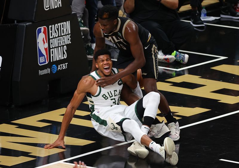 Giannis Antetokounmpo of the Milwaukee Bucks hurts his knee in Game 4