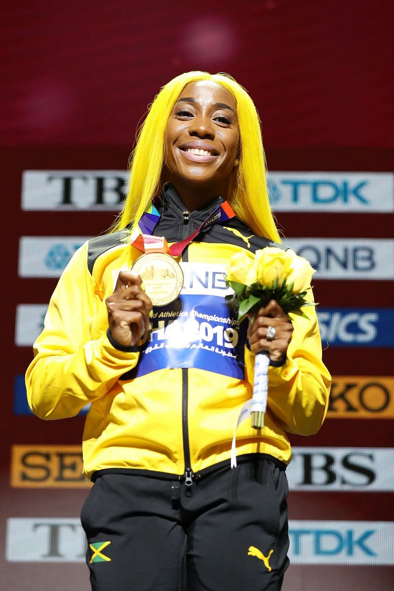 Shelly-Ann Fraser-Pryce poses with her gold medal after winning the women&#039;s 100 metre race event at the 2019 World Championships (Photo by Michael Heiman/Getty Images)