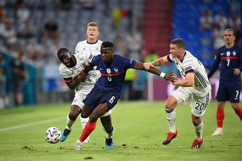 Paul Pogba battles for the ball during the match against Germany