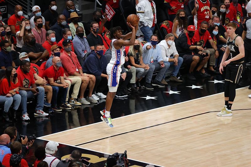 Tyrese Maxey #0 of the Philadelphia 76ers over Kevin Huerter of the Atlanta Hawks