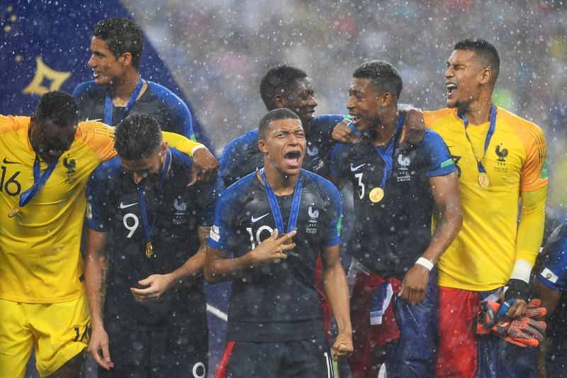 Giroud and Mbappe (centre) celebrate France&#039;s 2018 FIFA World Cup win