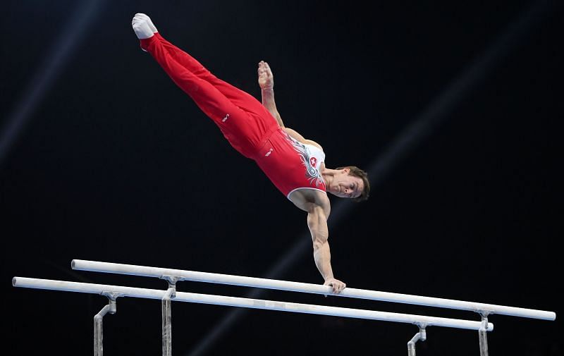 Christian Baumann of Switzerland competes on Parallel Bars during the Apparatus Finals of the European Artistic Gymnastics Championships at St. Jakobshalle on April 25, 2021 in Basel, Switzerland. (Photo by Matthias Hangst/Getty Images)