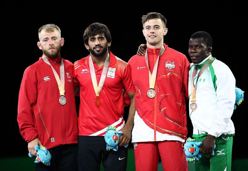 Bajrang Punia (2nd from L) along with other medal winners at 2018 Commonwealth Games