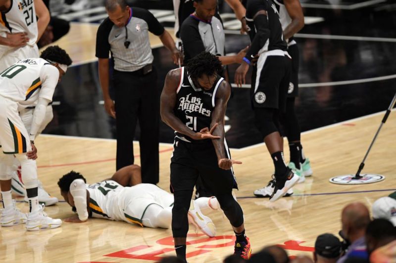 Patrick Beverley celebrates after scoring a three-pointer