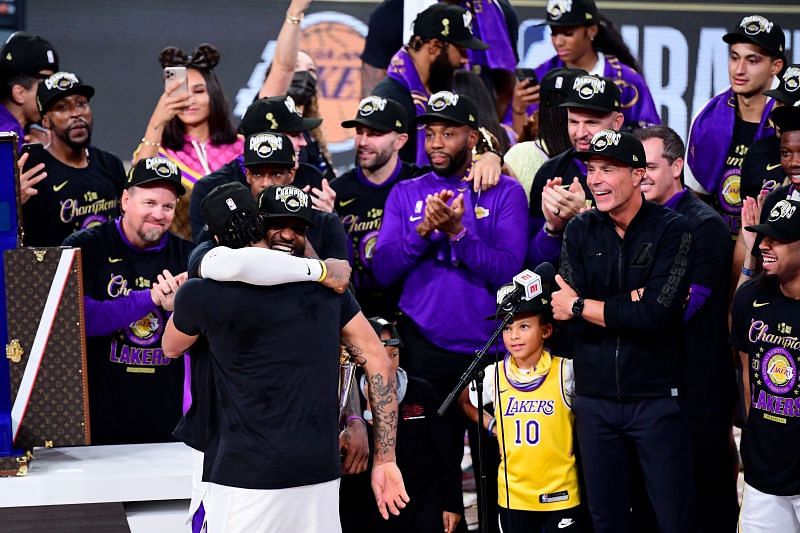 LeBron James #23 and Anthony Davis #3 of the LA Lakers react after winning the 2020 NBA Championship.