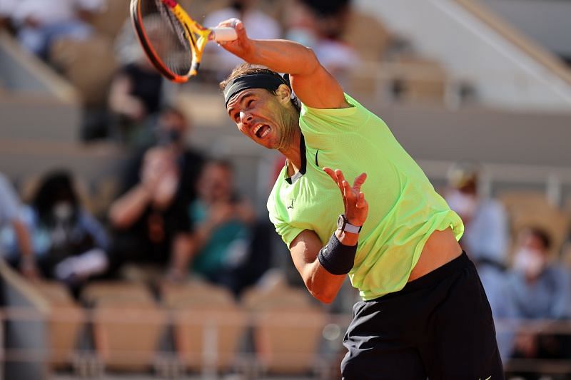 Rafael Nadal serves