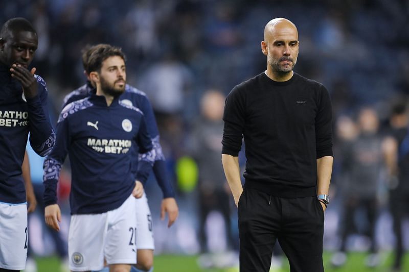 Manchester City manager Pep Guardiola (right) looks on during his side&#039;s 2020-21 Champions League final loss to Chelsea