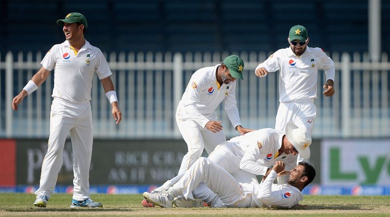 Shoaib Malik and Misbah-ul-Haq celebrate a wicket