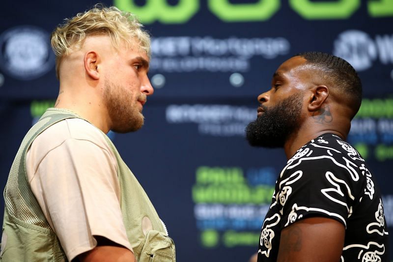 Jake Paul (left) faces off against Tyron Woodley (right)