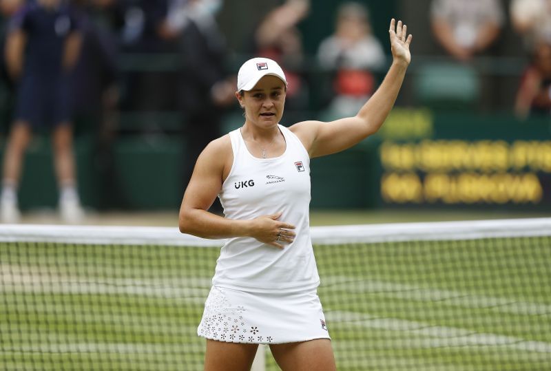 Ashleigh Barty waves to the Centre Court crowd during Wimbledon 2021