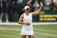 Ashleigh Barty waves to the Centre Court crowd during Wimbledon 2021