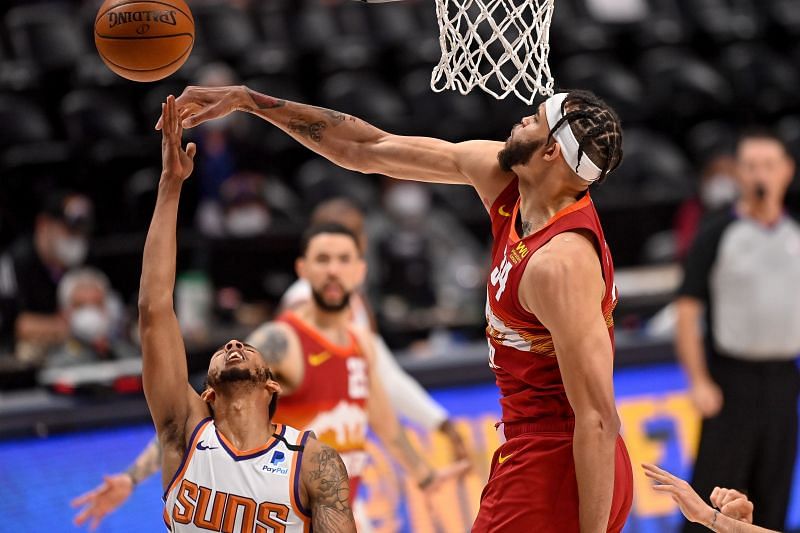 JaVale McGee #34 of the Denver Nuggets blocks a shot attempt by Cameron Payne #15 of the Phoenix Suns