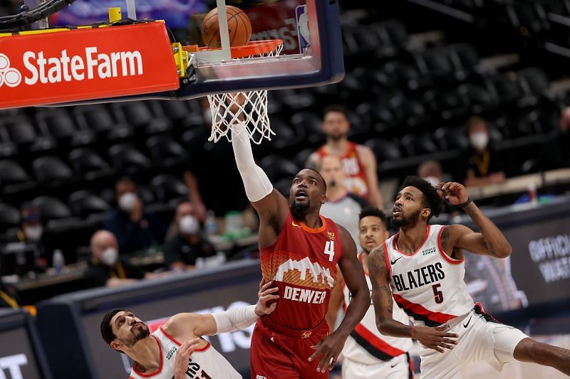 Paul Millsap drives to the basket in the NBA playoffs