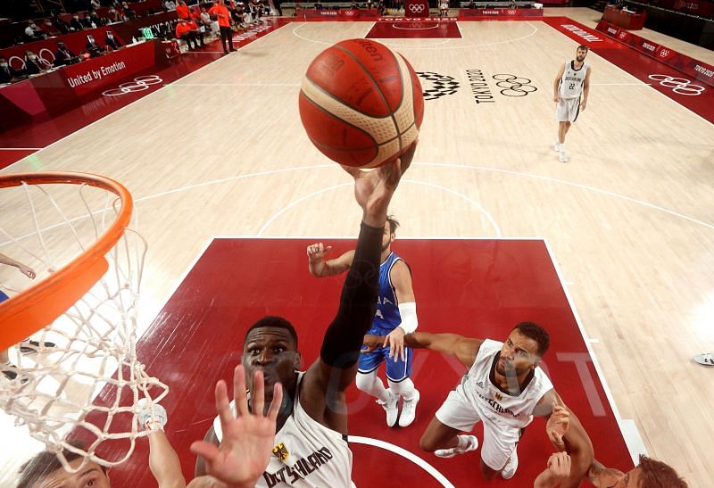 Isaac Bonga (#0) of Team Germany goes up for a shot against Italy.