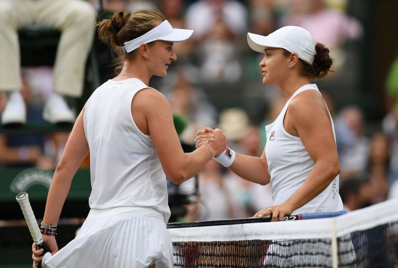 Barbora Krejcikova and Ashleigh Barty at the net after their match