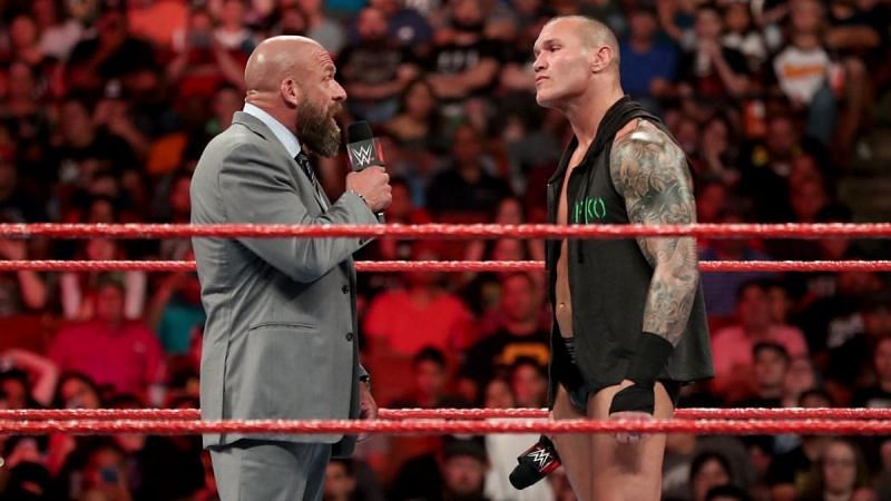 Triple H in the ring with Randy Orton on Monday Night RAW