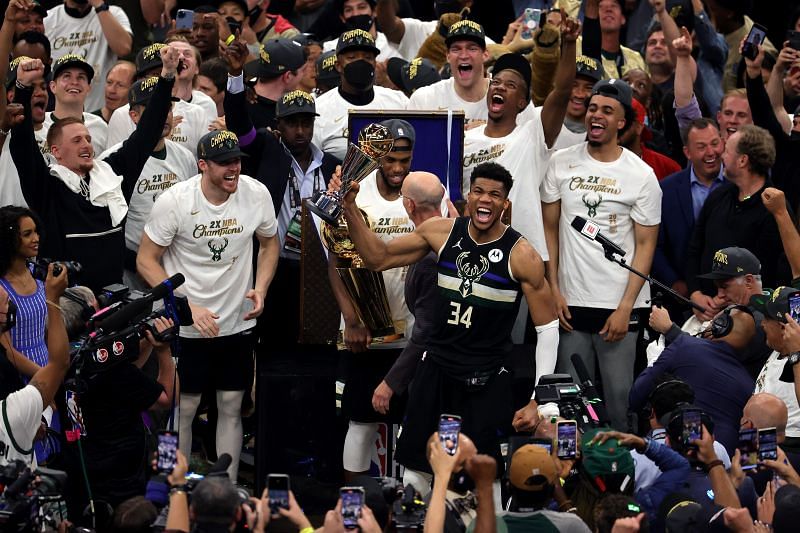 Giannis Antetokounmpo #34 celebrates winning the Bill Russell NBA Finals MVP Award.