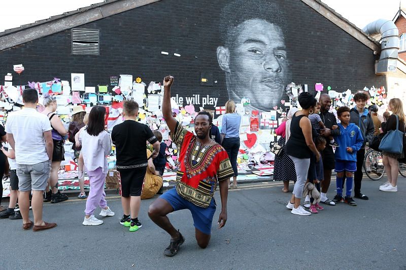 The defaced mural of Marcus Rashford was repaired in Manchester.