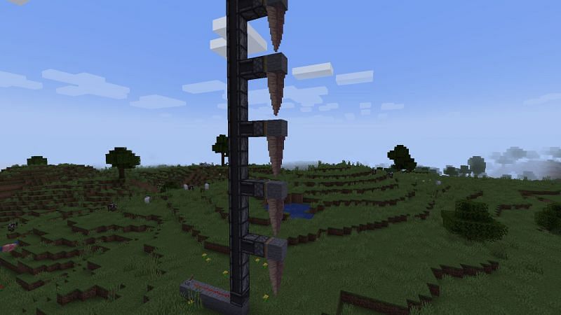 Pointed dripstone dropping contraption (Image via Minecraft)