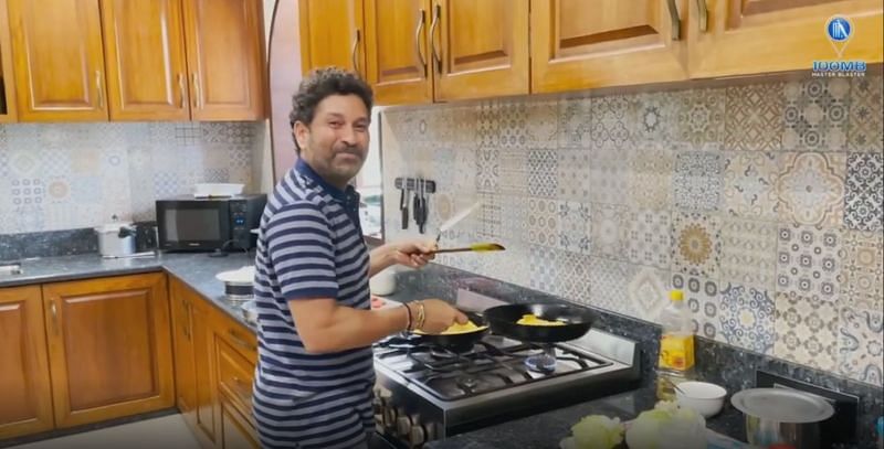 Sachin cooking a special dish in his kitchen