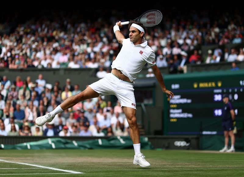 Roger Federer in action at Wimbledon 2021