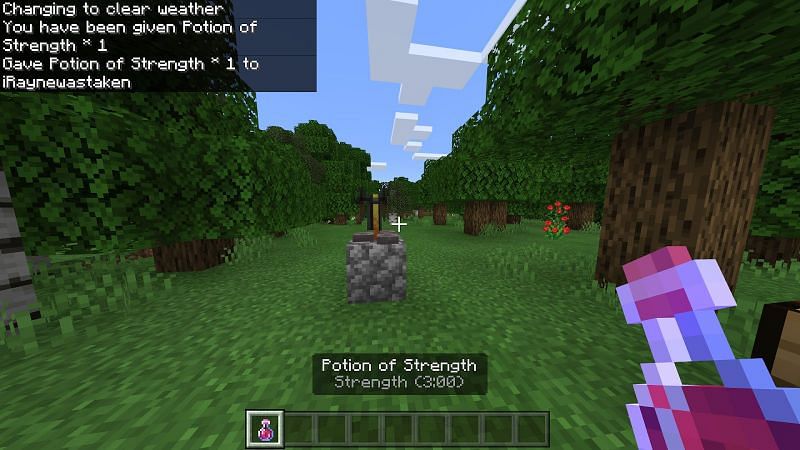 A player holding a three-minute potion of strength (Image via Minecraft)