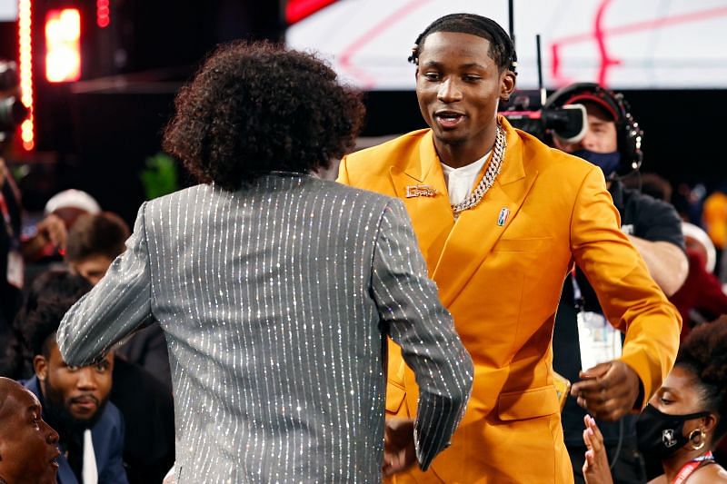 Jalen Green (L) and Jonathan Kuminga celebrate after Green was drafted by the Houston Rockets during the 2021 NBA Draft.