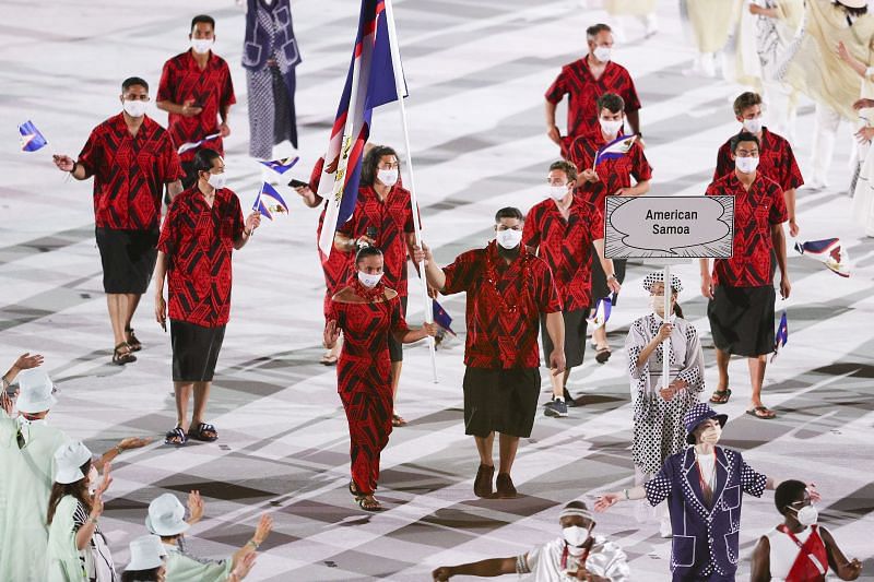 Flag bearers Tilali Scanlan and Tanumafili Malietoa Jungblut of Team American Samoa