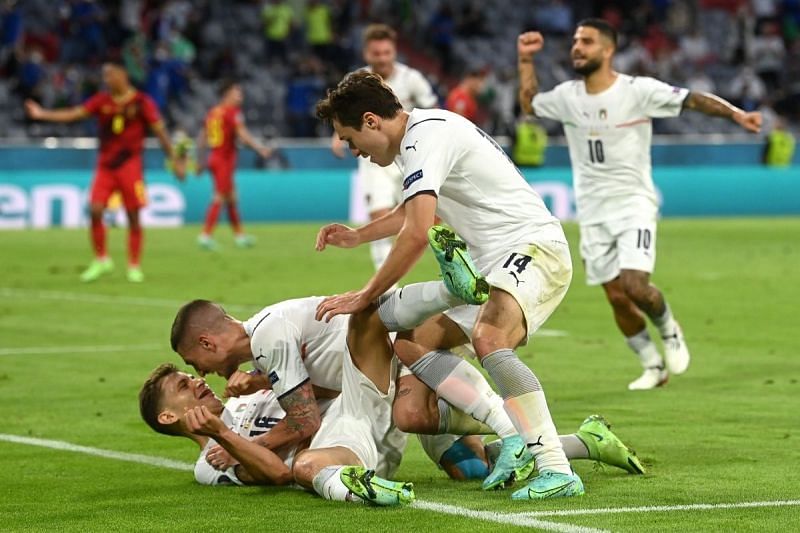 Italy players exult after scoring against Belgium in the quarter-finals.
