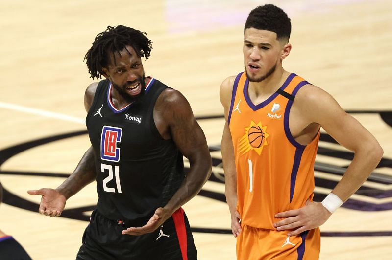 Patrick Beverley #21 reacts against Devin Booker #1