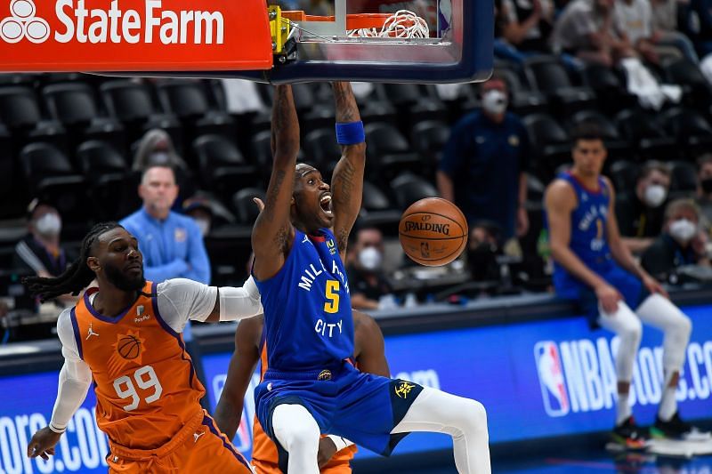 Will Barton #5 of the Denver Nuggets has a slam dunk.