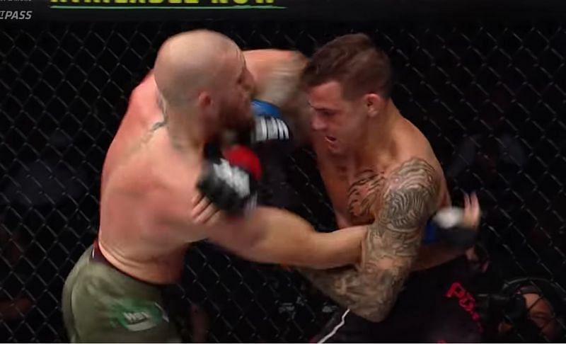 Conor McGregor hits Dustin Poirier with an elbow strike