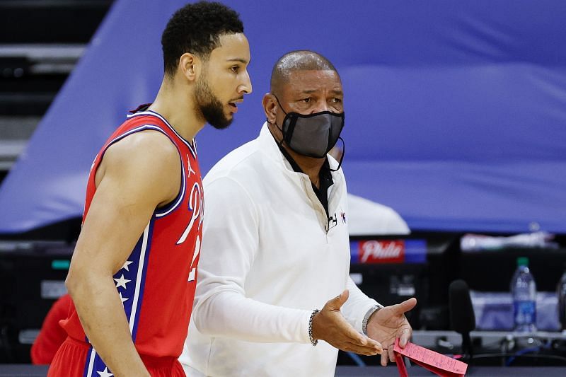 Head coach Doc Rivers speaks with Ben Simmons #25 during the first quarter against the Lakers