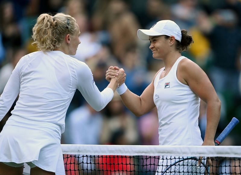 Katerina Siniakova and Ashleigh Barty at the net