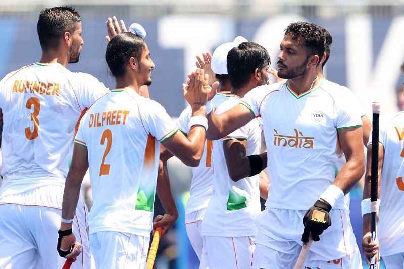 Dilpreet Singh #2 and Harmanpreet Singh #13 of Team India celebrate